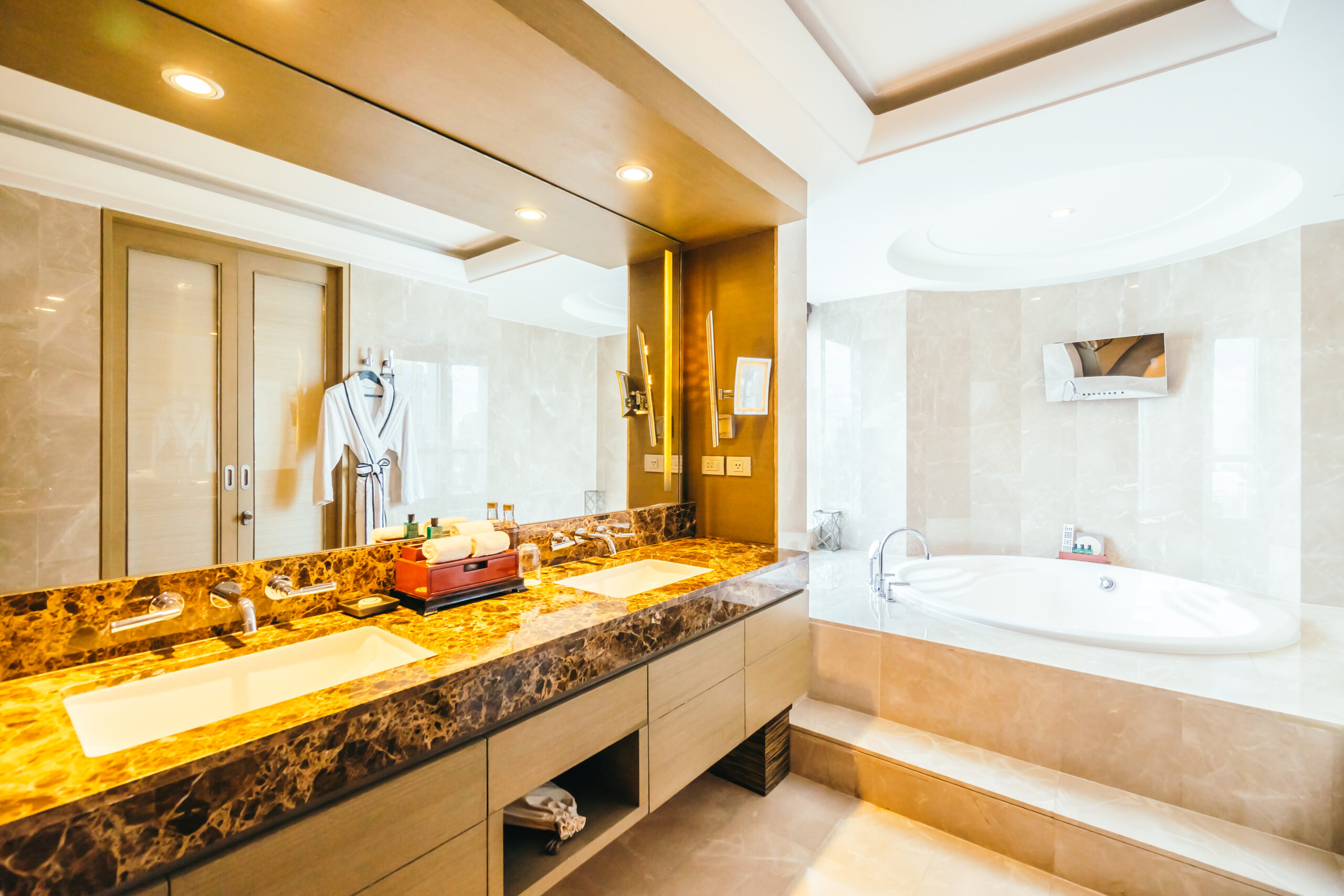 custom bathroom cabinets in well lit bathroom
